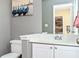 Clean bathroom featuring a modern sink, vanity, and decorative wall art at 3090 Perch Overlook Sw, Marietta, GA 30008