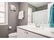 Bathroom featuring a white vanity, toilet, and shower with curtain at 3090 Perch Overlook Sw, Marietta, GA 30008