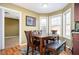 Cozy dining room with natural light and modern wood flooring at 3090 Perch Overlook Sw, Marietta, GA 30008