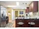 Well-equipped kitchen featuring stainless steel appliances, granite countertops, and ample cabinet space at 3090 Perch Overlook Sw, Marietta, GA 30008