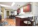 Open kitchen with granite countertops, stainless steel appliances, and adjacent dining area at 3090 Perch Overlook Sw, Marietta, GA 30008
