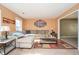 Cozy living room with plush carpeting, natural light, and comfortable seating at 3090 Perch Overlook Sw, Marietta, GA 30008