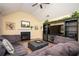 Spacious living room featuring a fireplace, vaulted ceiling, and entertainment center at 3090 Perch Overlook Sw, Marietta, GA 30008