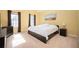 Spacious bedroom with carpeted floors, natural light, and ample closet space at 3090 Perch Overlook Sw, Marietta, GA 30008