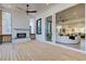 Charming screened porch featuring a brick fireplace and seamless indoor-outdoor living at 555 Lower Birmingham Rd, Canton, GA 30115
