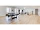 Open basement with entertainment area, pool table, and modern decor at 555 Lower Birmingham Rd, Canton, GA 30115