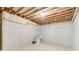 Unfinished basement with white painted walls, ready for customization to suit your needs at 555 Lower Birmingham Rd, Canton, GA 30115
