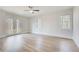 Bright and airy bedroom with double doors leading to a private balcony and wooded views at 555 Lower Birmingham Rd, Canton, GA 30115