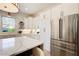 A gourmet kitchen featuring stainless steel appliances, white cabinets, and a spacious island at 555 Lower Birmingham Rd, Canton, GA 30115