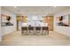 Spacious kitchen features a large island with seating, custom cabinets, and modern appliances at 555 Lower Birmingham Rd, Canton, GA 30115