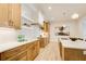 Bright kitchen with marble countertops, stainless steel appliances, and stylish lighting at 555 Lower Birmingham Rd, Canton, GA 30115