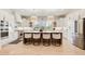 Kitchen with large center island, modern lighting, stainless steel appliances, and white cabinets at 555 Lower Birmingham Rd, Canton, GA 30115