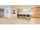 Spacious kitchen features a large island with seating, custom cabinets, and modern appliances at 555 Lower Birmingham Rd, Canton, GA 30115
