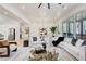 Spacious living room with a large sofa, modern decor, and natural light at 555 Lower Birmingham Rd, Canton, GA 30115