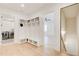 Mud room area with built in storage, laundry area, and passage to stairs and bedroom at 555 Lower Birmingham Rd, Canton, GA 30115