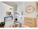 Stylish office featuring built-in shelving and cabinets, and a unique clock at 555 Lower Birmingham Rd, Canton, GA 30115