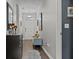 Inviting entryway with hardwood floors, bench seating, and stylish decor at 6028 Providence Dr, Union City, GA 30291