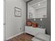Hallway with a white cabinet and a mirror and decorative items at 6028 Providence Dr, Union City, GA 30291