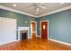 Spacious bedroom with gorgeous hardwood floors and a cozy fireplace at 1627 Walker Ave, College Park, GA 30337