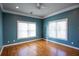 Spacious bedroom with gorgeous hardwood floors and large windows at 1627 Walker Ave, College Park, GA 30337
