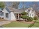 Charming one-story home featuring a welcoming front porch and well-maintained landscaping at 1627 Walker Ave, College Park, GA 30337