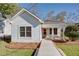 Charming one-story home featuring a welcoming front porch and well-maintained landscaping at 1627 Walker Ave, College Park, GA 30337