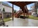A cozy backyard patio area perfect for outdoor relaxation and entertaining. Features wooden fence and stairs to deck at 2605 Jacobean Rd, Acworth, GA 30101