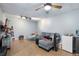 Versatile basement features a cozy seating area, entertainment setup, and kitchenette at 2605 Jacobean Rd, Acworth, GA 30101