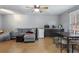Multi-functional basement area with comfortable seating, dining space, and kitchenette at 2605 Jacobean Rd, Acworth, GA 30101