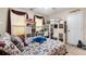 Bedroom with a comfortable bed, neutral walls, and ample storage with shelving at 2605 Jacobean Rd, Acworth, GA 30101