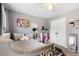 Inviting bedroom with neutral decor, closet, and cozy bed setup, offering comfort and style at 2605 Jacobean Rd, Acworth, GA 30101