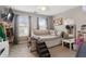 Bright bedroom features a bed with storage and natural light from windows at 2605 Jacobean Rd, Acworth, GA 30101