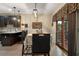The kitchen dining area overlooks the outside deck and features a window valance and decorative lighting at 2605 Jacobean Rd, Acworth, GA 30101