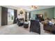Inviting living room featuring a fireplace, large windows, and comfortable seating arrangement at 2605 Jacobean Rd, Acworth, GA 30101