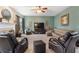 Bright living room with plush seating, modern entertainment setup, and cozy ambiance at 2605 Jacobean Rd, Acworth, GA 30101