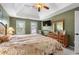 Bright main bedroom with tray ceiling, large dresser, and a comfortable, inviting atmosphere at 2605 Jacobean Rd, Acworth, GA 30101