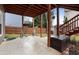 Covered patio with seating area offers a relaxing outdoor space for entertaining or enjoying quiet moments at 2605 Jacobean Rd, Acworth, GA 30101
