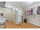 Walk-in closet features custom shelving, hardwood floors, and plenty of storage space at 4073 Hickory Fairway Dr, Woodstock, GA 30188
