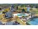 Aerial view showcasing a community pool, playground, and tennis courts at 4073 Hickory Fairway Dr, Woodstock, GA 30188