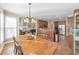 Cozy dining area connected to kitchen and living room; perfect for entertaining guests at 4073 Hickory Fairway Dr, Woodstock, GA 30188