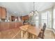 Inviting dining area with wood floors and natural light open to living areas at 4073 Hickory Fairway Dr, Woodstock, GA 30188