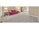 Open living room featuring neutral carpet, recessed lighting, and views of the dining room at 4073 Hickory Fairway Dr, Woodstock, GA 30188