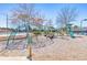 Community playground featuring slides, climbing structures, and a safety surface at 4073 Hickory Fairway Dr, Woodstock, GA 30188
