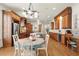 Spacious kitchen with a large dining area, hardwood floors, and plenty of storage at 13142 Overlook Pass, Roswell, GA 30075