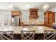 Stylish kitchen with stainless steel appliances, granite countertops, and plenty of natural light at 13142 Overlook Pass, Roswell, GA 30075