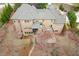 Aerial view of the home's rear exterior, highlighting the screened porch and upper-level deck at 13142 Overlook Pass, Roswell, GA 30075