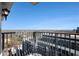Wide view from balcony overlooking a lake and the city skyline with a bright blue sky at 195 14Th Ne St # Ph 306, Atlanta, GA 30309