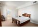 A bedroom with simple decor and large windows provides lots of natural light at 195 14Th Ne St # Ph 306, Atlanta, GA 30309