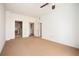Spacious bedroom with neutral carpet and access to walk-in closet and laundry room at 195 14Th Ne St # Ph 306, Atlanta, GA 30309