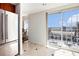 Bright kitchen featuring stainless steel refrigerator and sliding glass doors to a terrace at 195 14Th Ne St # Ph 306, Atlanta, GA 30309